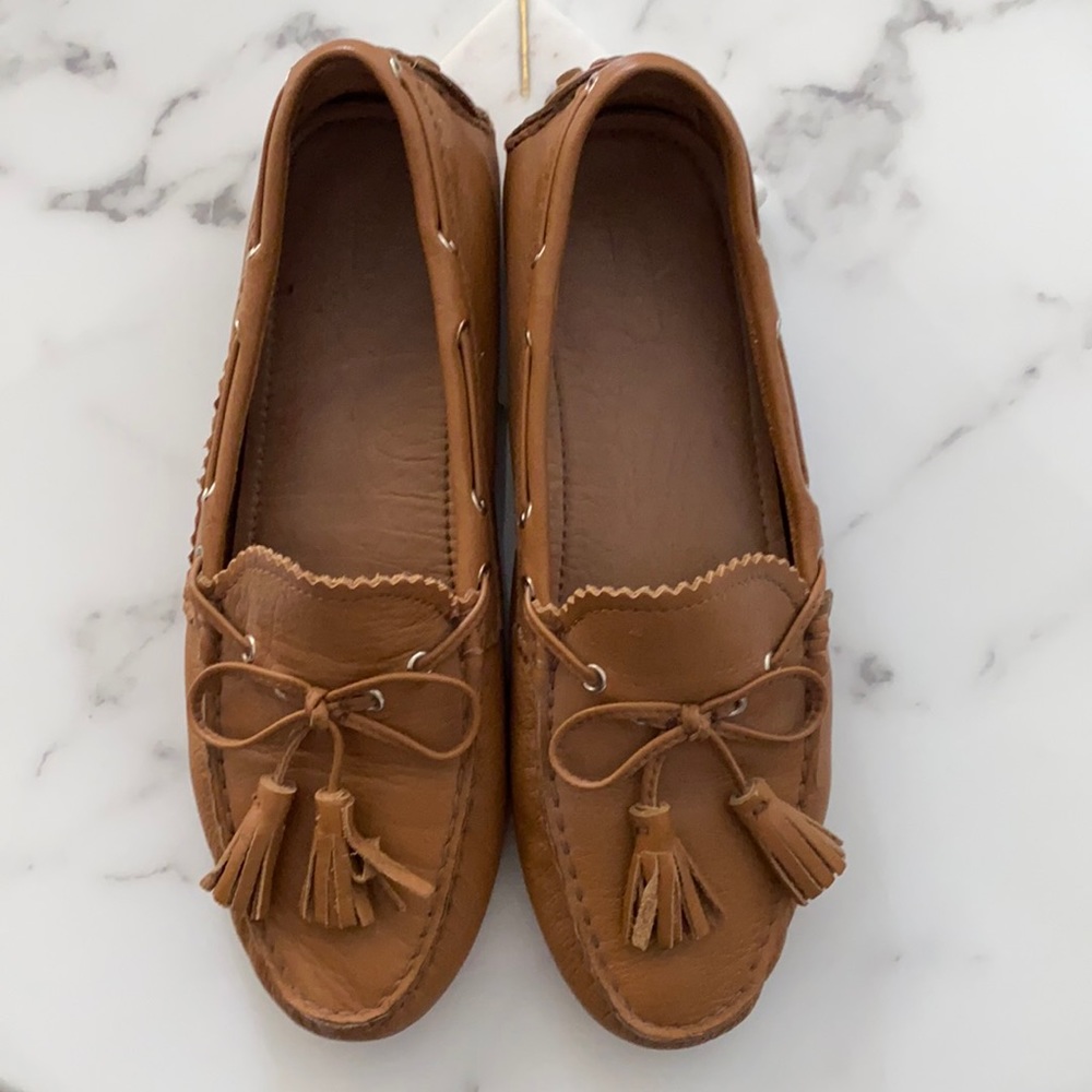 Women’s Coach leather slip ons. US 7.5